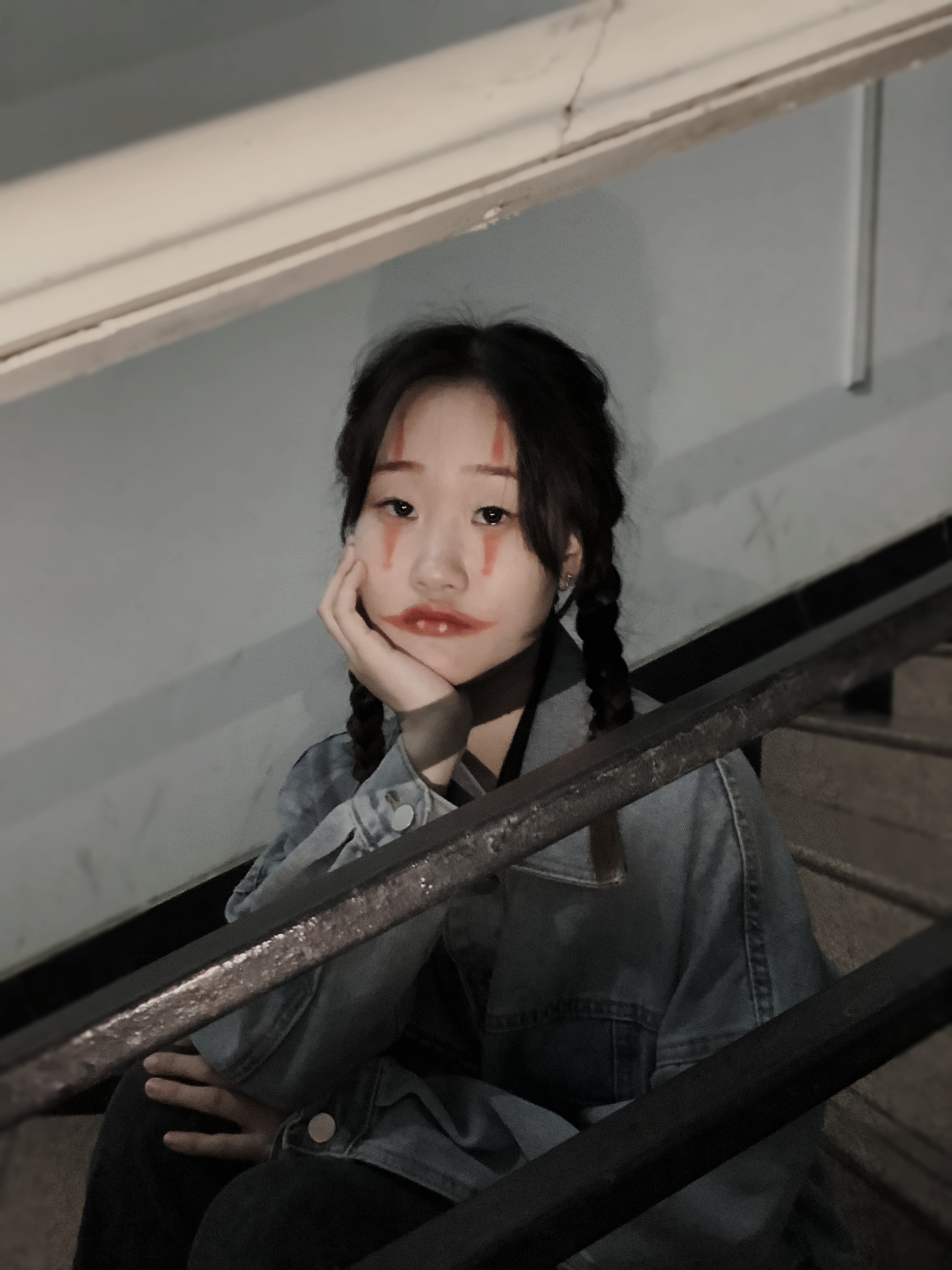 七七